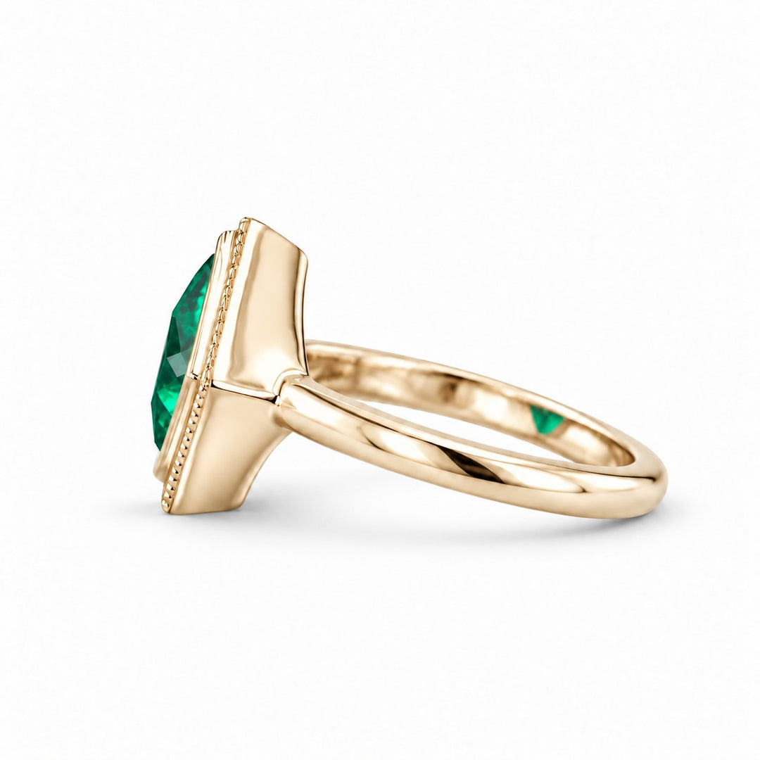 The Compass — Milgrain Bezel Emerald Ring in 14K yellow gold, side view