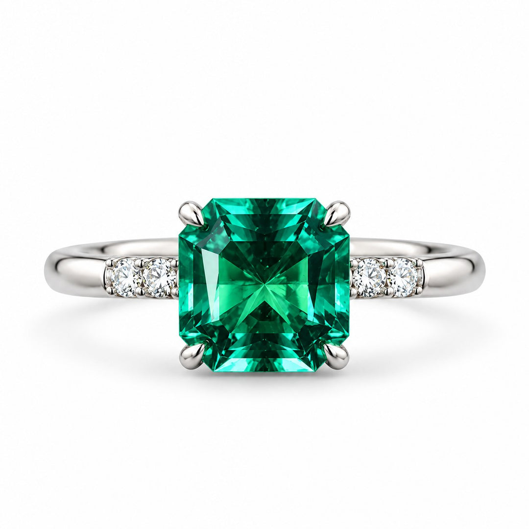 The Calibre — Emerald Accent Ring in 14K white gold, front view