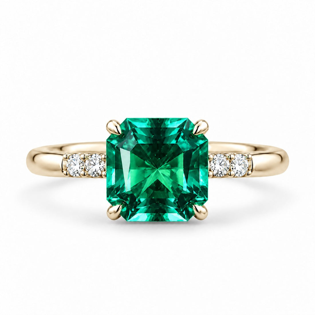 The Calibre — Emerald Accent Ring in 14K yellow gold, front view