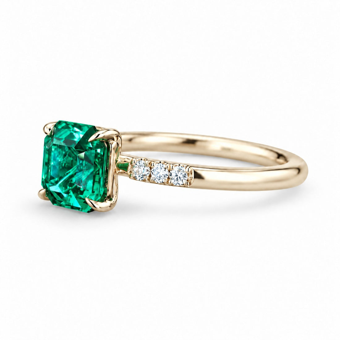 The Calibre — Emerald Accent Ring in 14K yellow gold, side view
