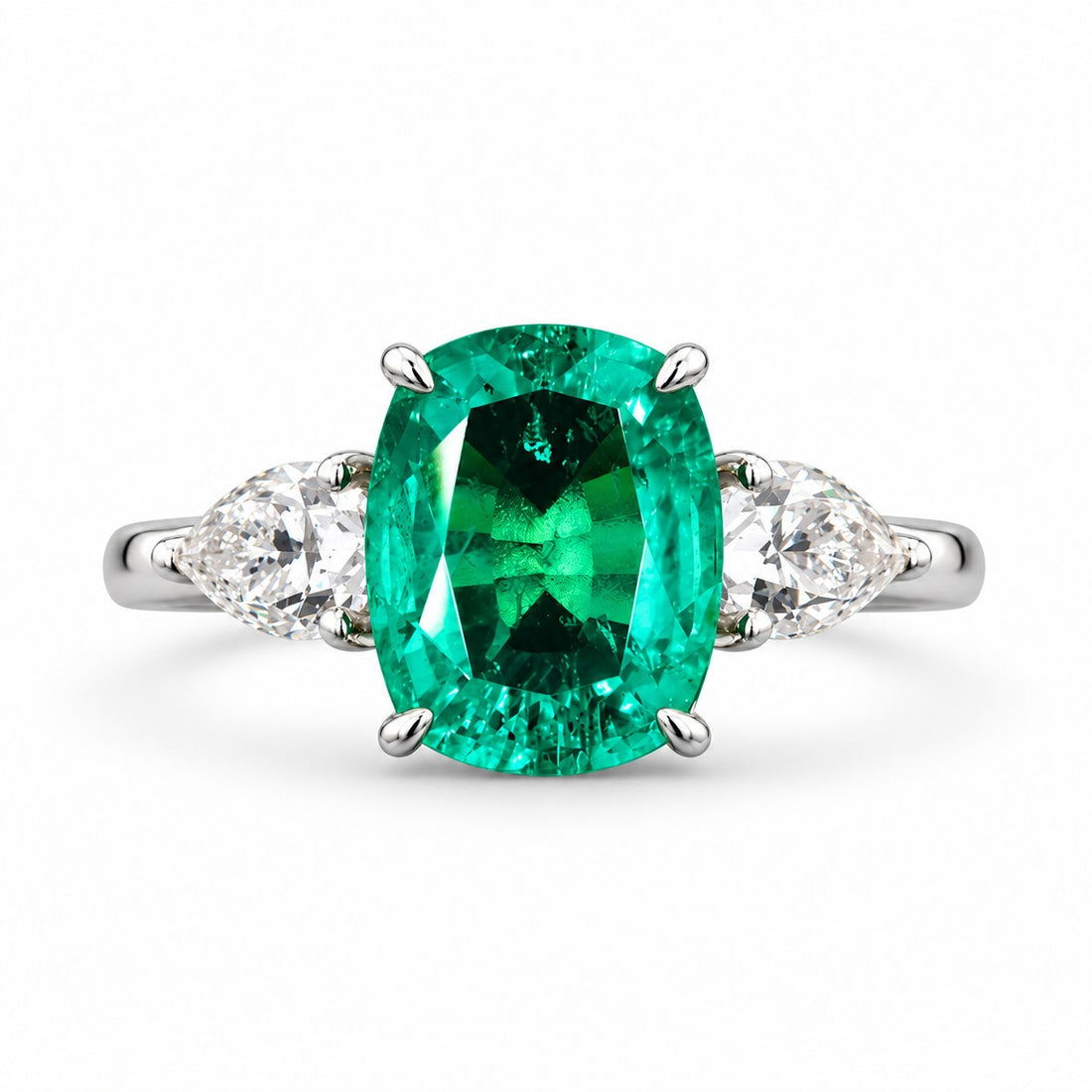 The Elysian — Cushion Three-Stone Emerald Ring in 14K white gold, front view