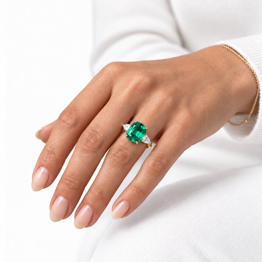 The Elysian — Cushion Three-Stone Emerald Ring