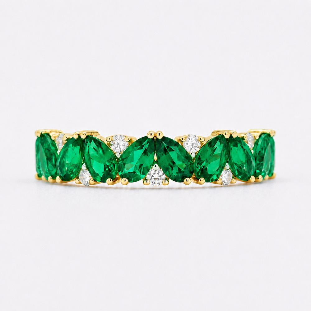 Pear emerald and diamond eternity ring in 14K yellow gold