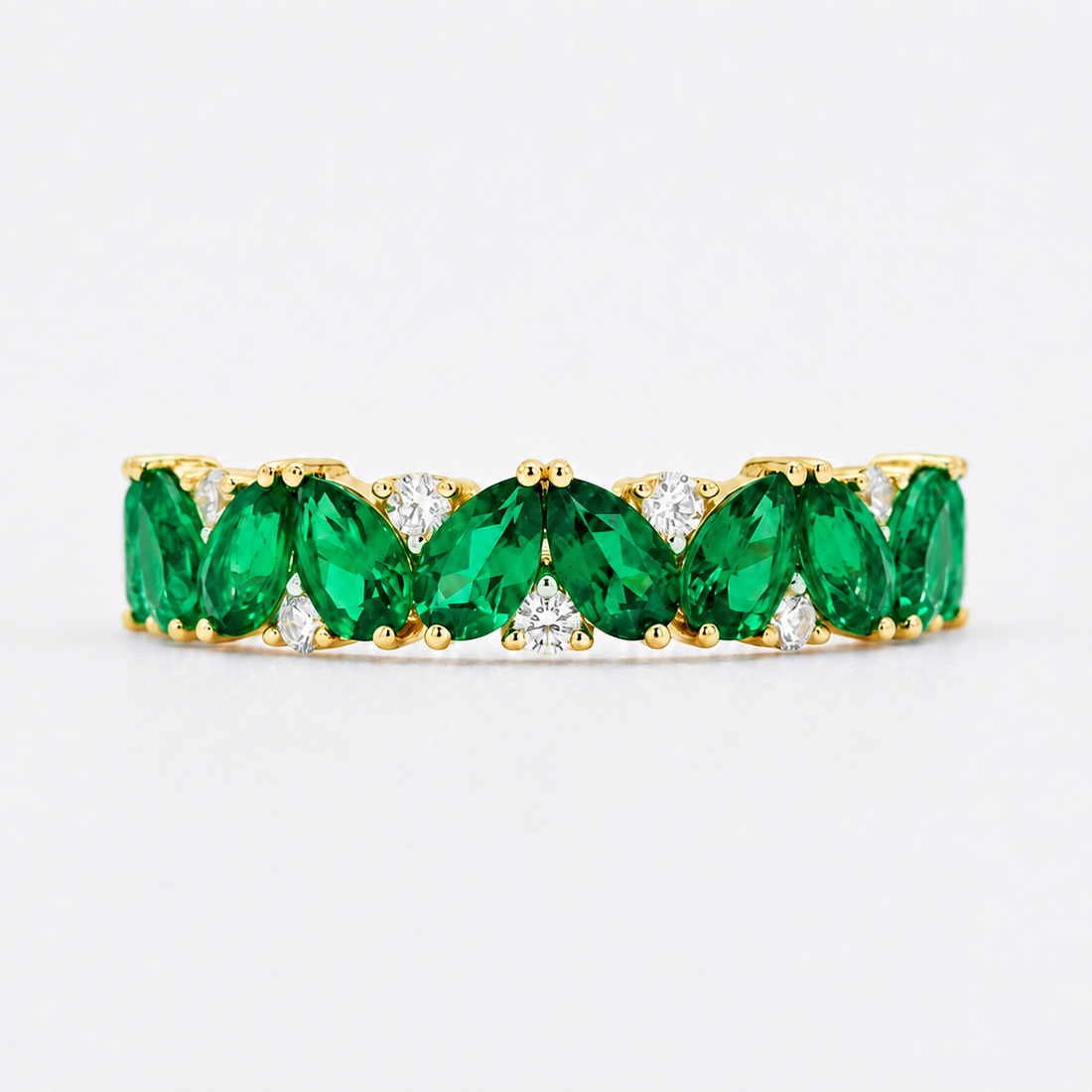 Pear emerald and diamond eternity ring in 14K yellow gold