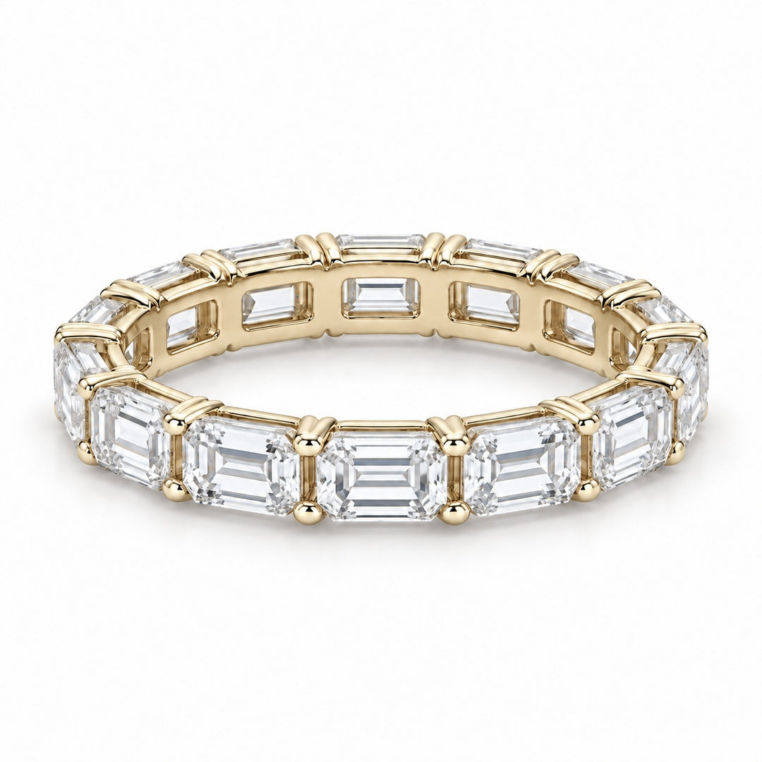 Emerald-cut lab-grown diamond eternity band, 4x3mm, 14K yellow gold, angled view