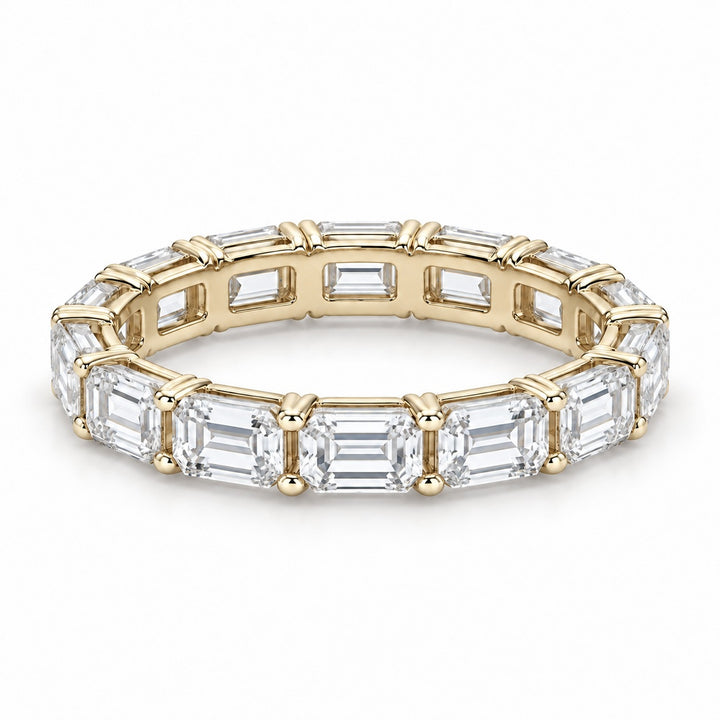 Emerald-cut lab-grown diamond eternity band, 4x3mm, 14K yellow gold, angled view