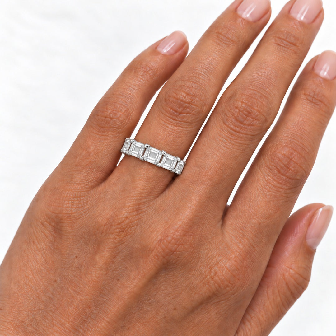 Emerald-cut lab-grown diamond eternity band, 5x3.5mm, 14K white gold, on the hand