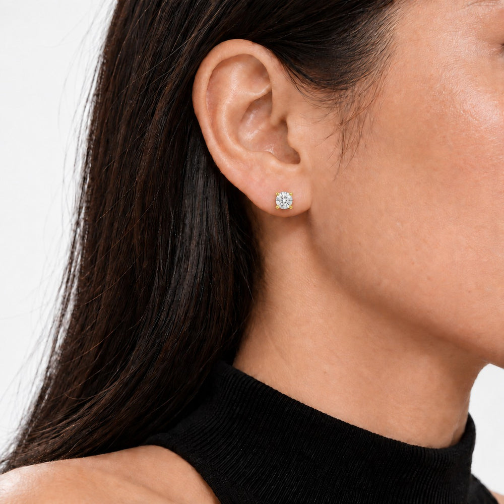 Classic Four-Prong Lab Diamond Stud Earrings worn on the ear in 14K Yellow Gold