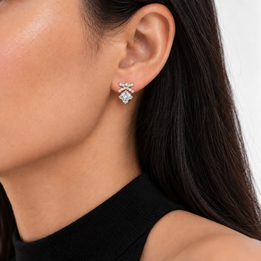Asscher Bow Lab Diamond Stud Earrings worn on the ear in 14K Rose Gold