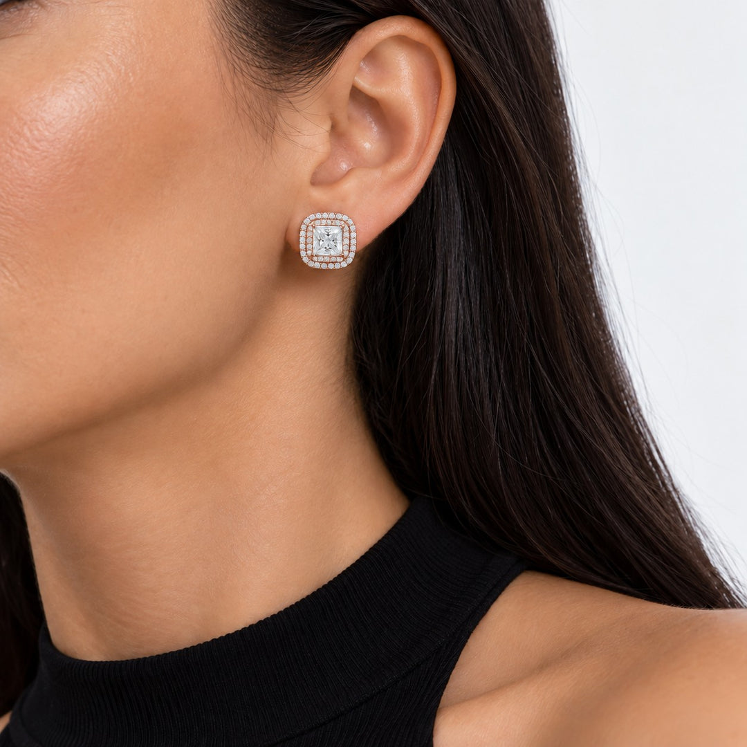 Princess Double Halo Lab Diamond Stud Earrings worn on the ear in 14K Rose Gold