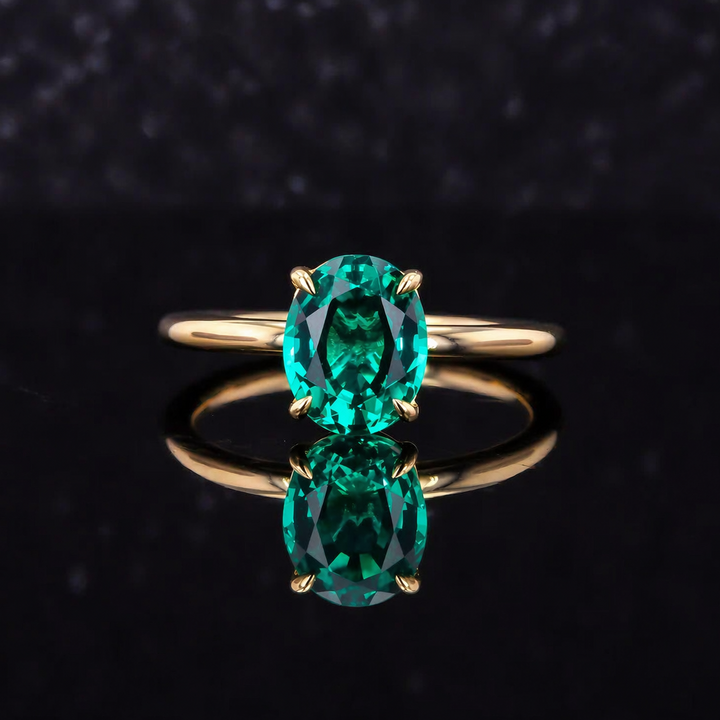 The Essence — Oval Emerald Ring