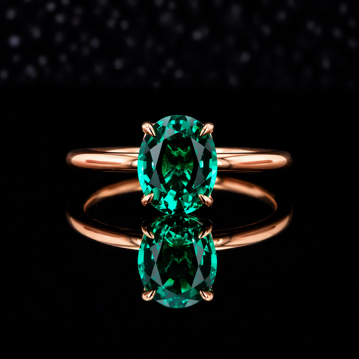 The Essence — Oval Emerald Ring