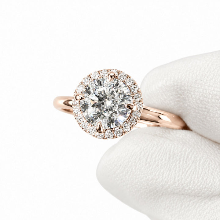 The Floating Halo in 14K rose gold, close-up in hand