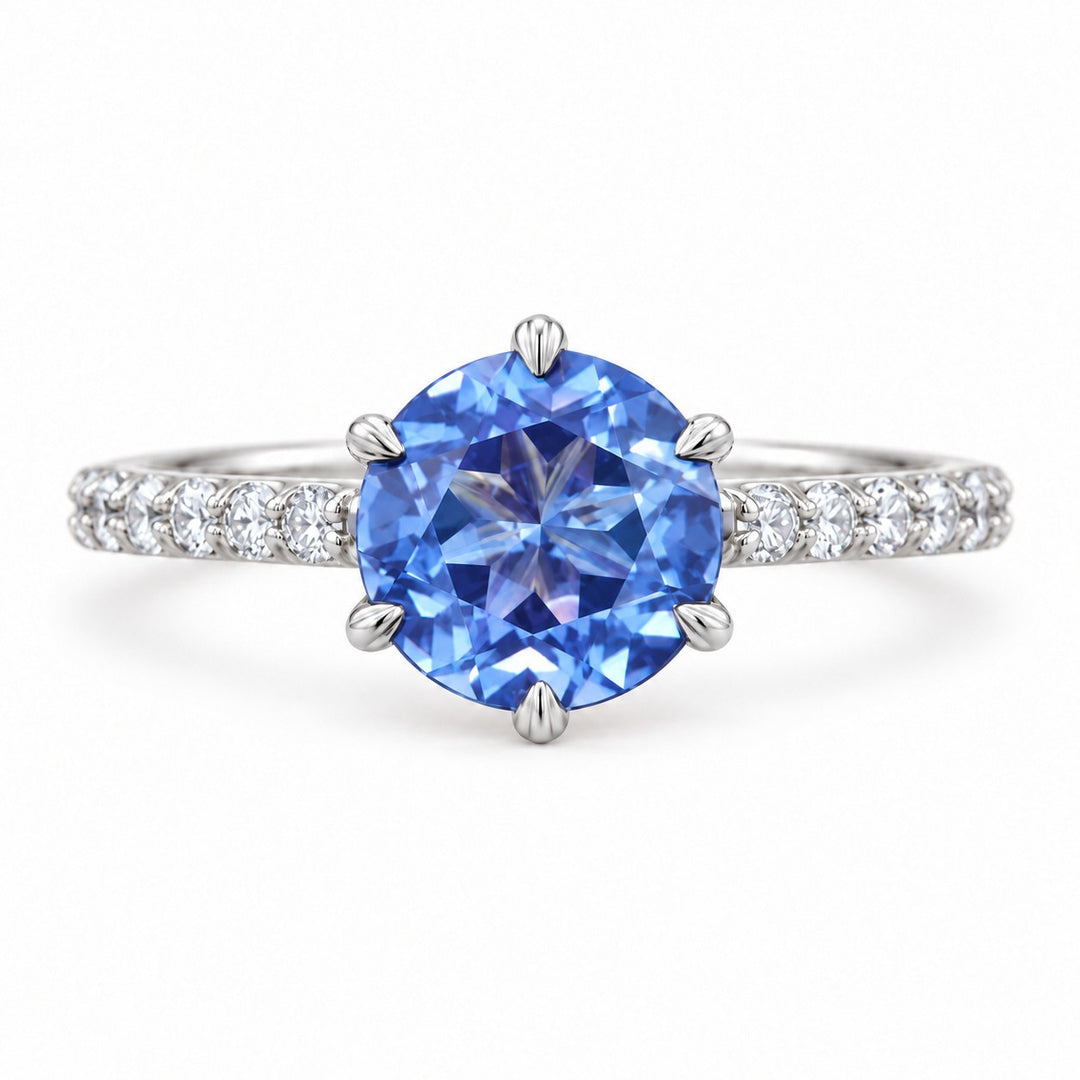 The Bluebell — Blue Round Sapphire with Floral Prongs & Diamond Half-Eternity Ring in white gold