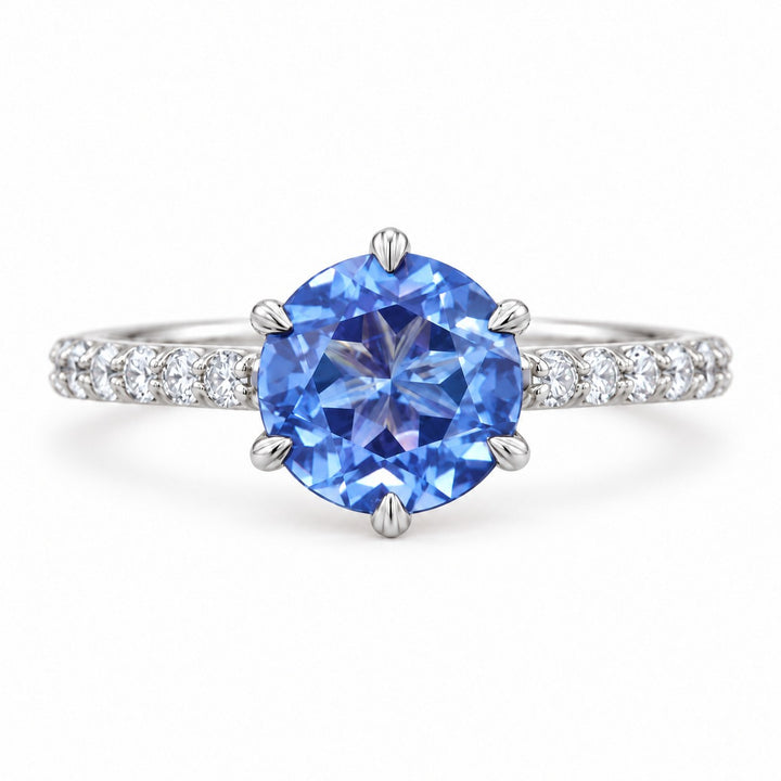 The Bluebell — Blue Round Sapphire with Floral Prongs & Diamond Half-Eternity Ring in white gold