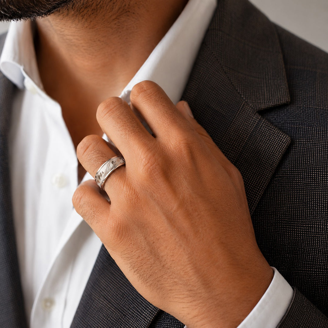 The Ocean Wave Vintage — 7mm Hand-Carved Solid Gold Wedding Band in white gold, wearing