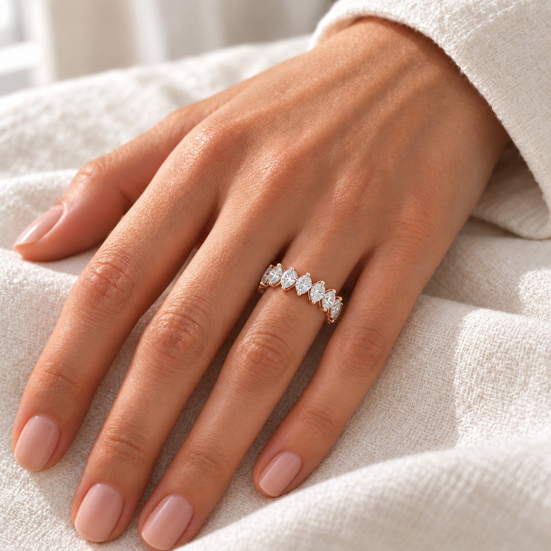 Interlocking Pear Lab Diamond Eternity Band (4mm, 3.00ctw) in rose gold, on the hand
