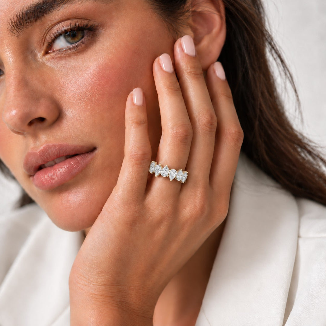 Interlocking Pear Lab Diamond Eternity Band (4mm, 3.00ctw) in yellow gold, wearing