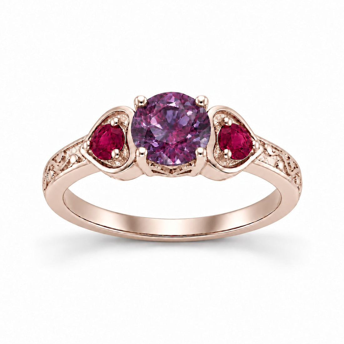 The Roserie — Alexandrite & Ruby Three-Stone Ring in 14K rose gold, in warm light