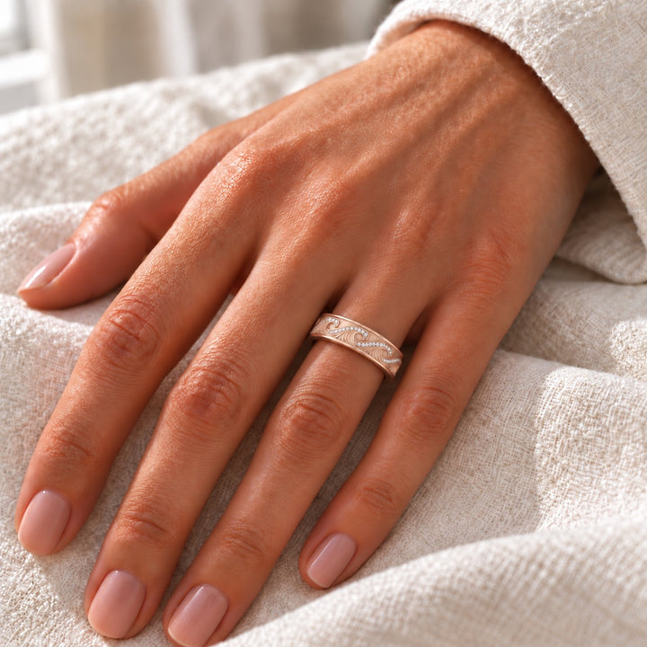 The Ocean Wave Vintage — 4mm Hand-Carved Diamond Wedding Band in rose gold, on the hand