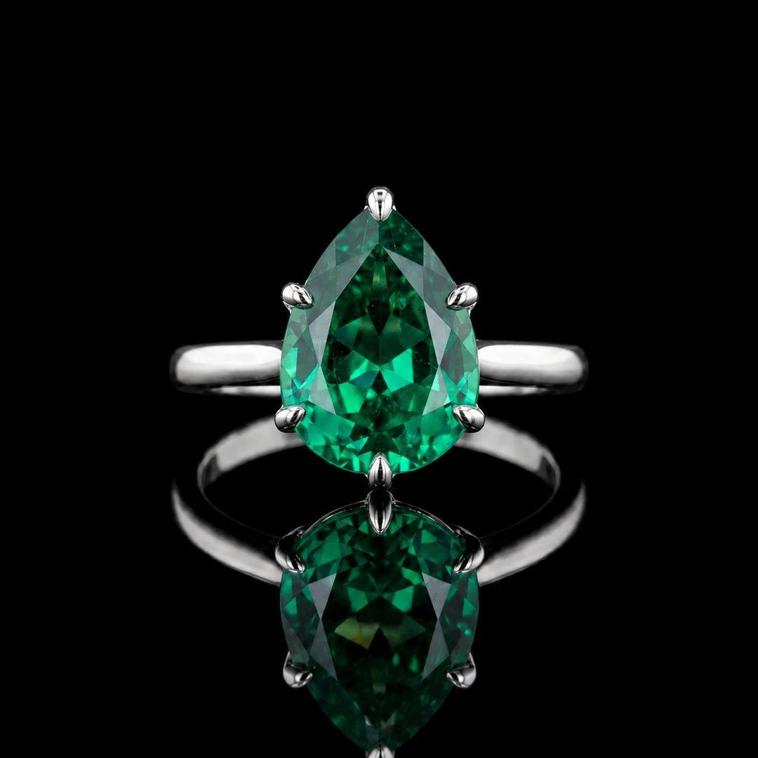 The Lotus Lace — Pear Emerald Ring (Petal Setting)