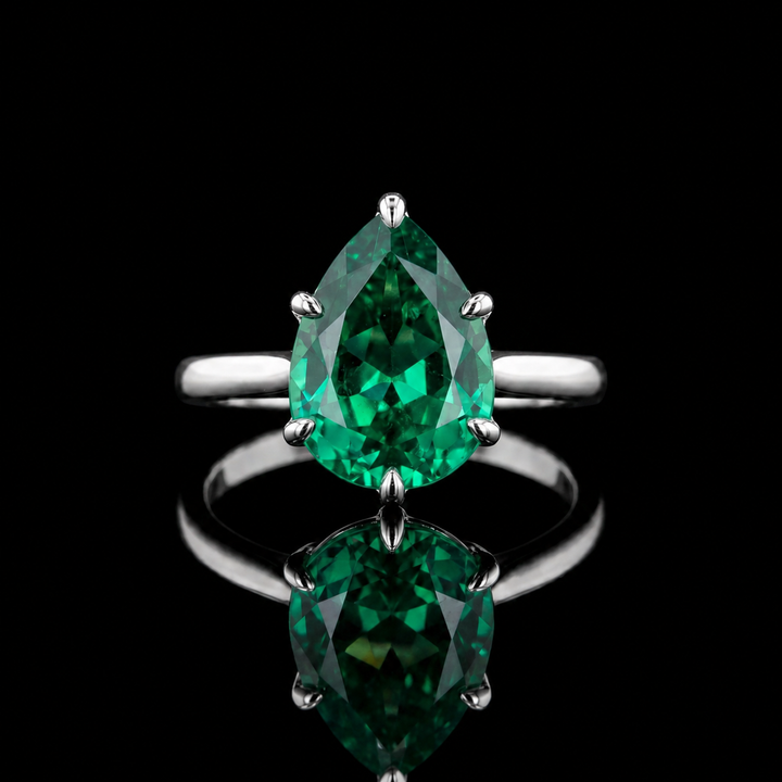 The Lotus Lace — Pear Emerald Ring (Petal Setting)