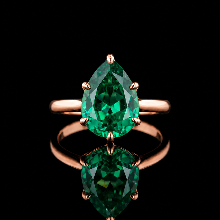 The Lotus Lace — Pear Emerald Ring (Petal Setting)