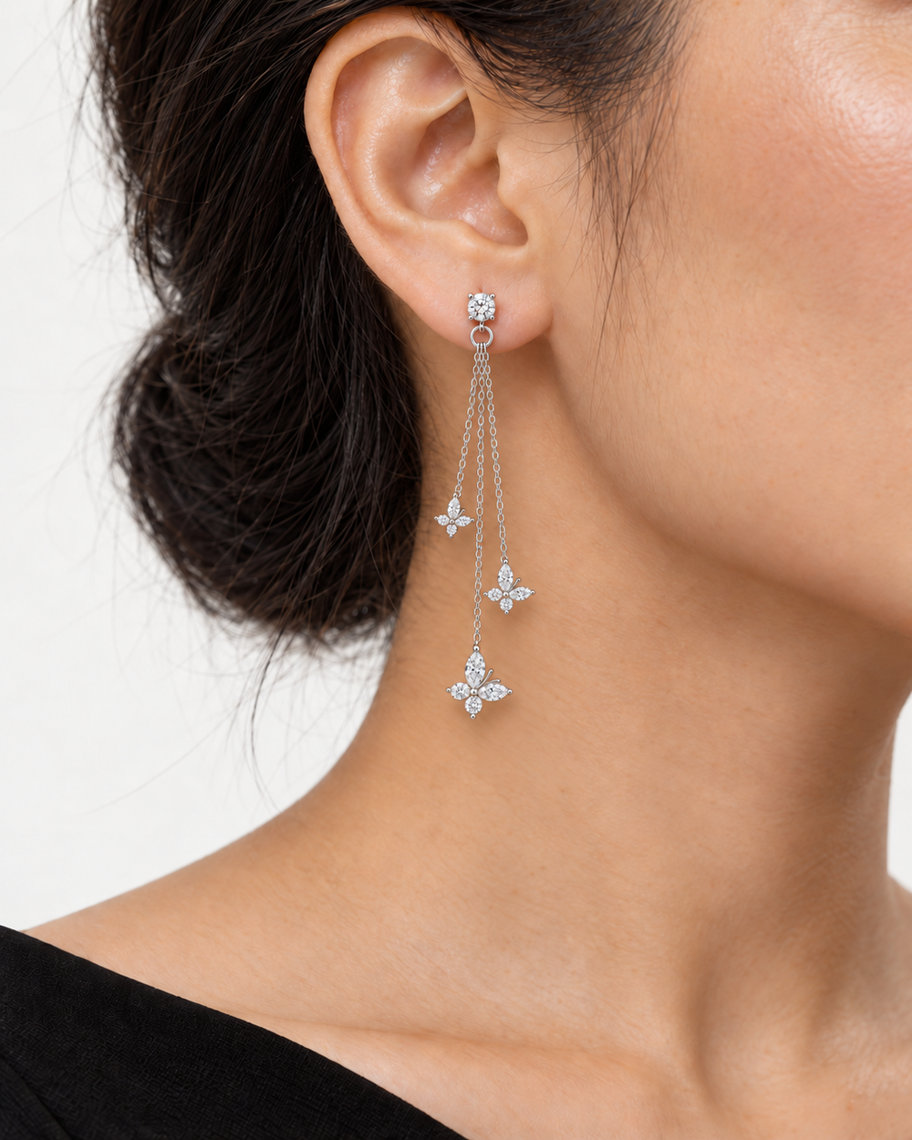 The Jardin Butterfly Lab Diamond Drop Earrings worn on the ear