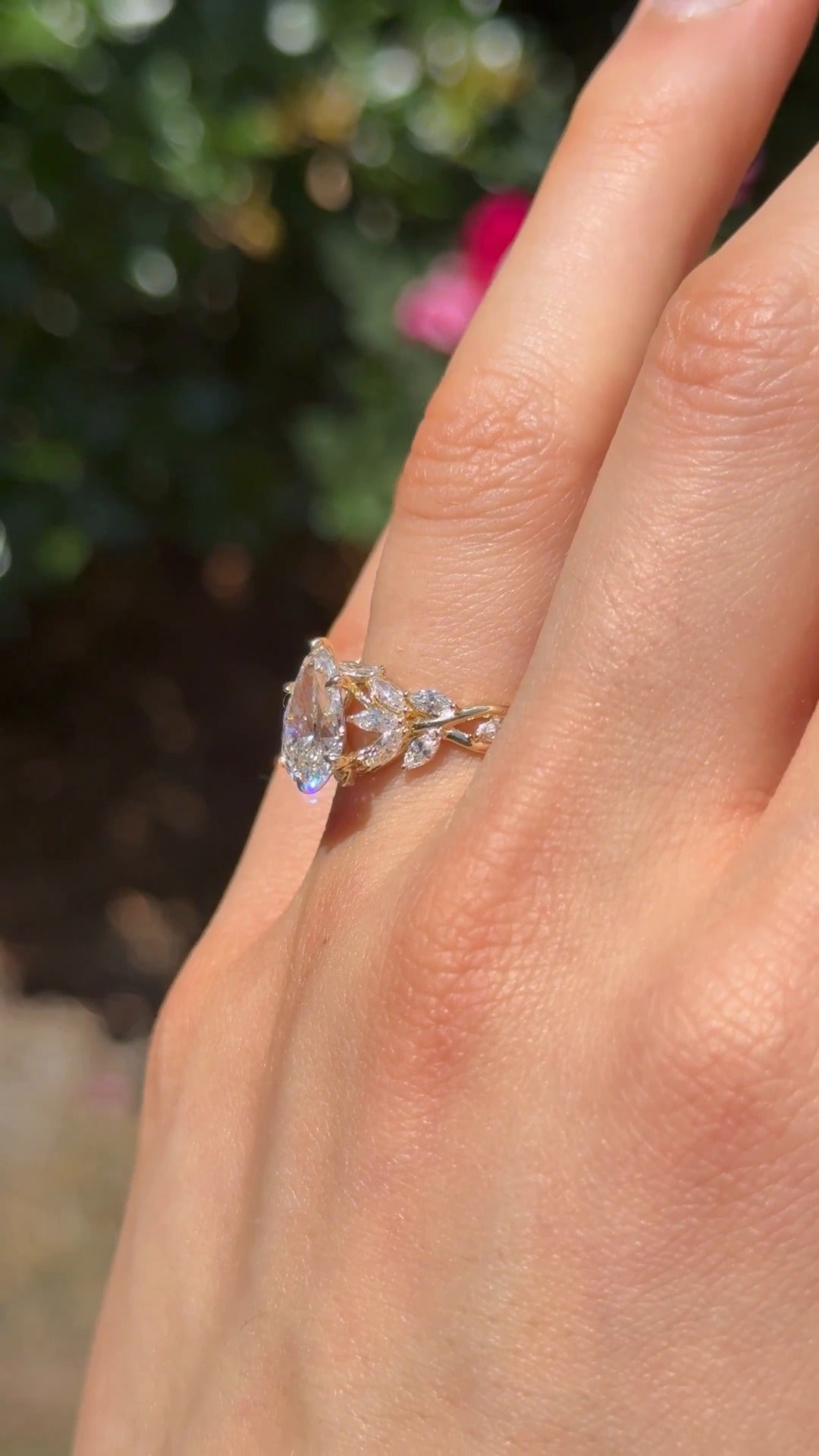 The Magnolia in 14K yellow gold, on the hand, close-up