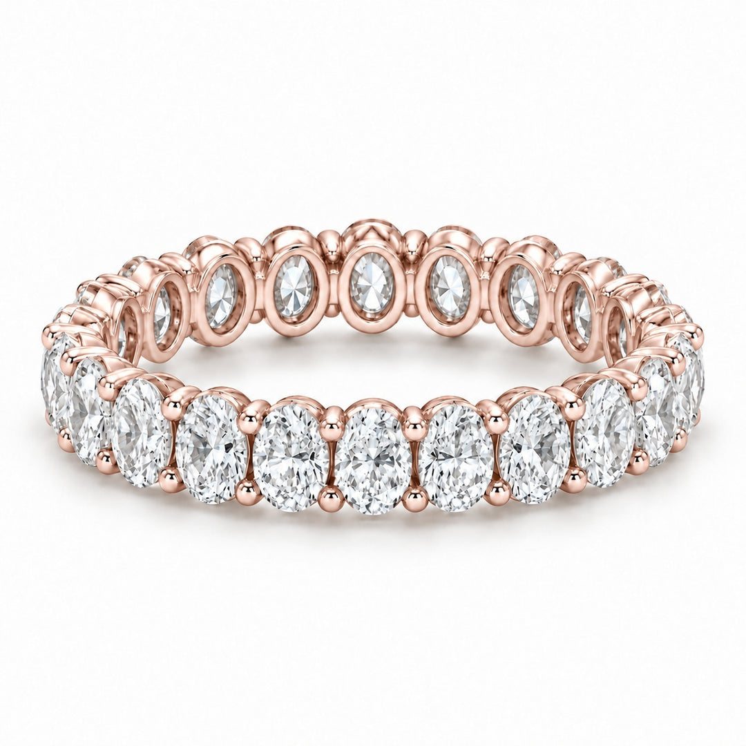 Oval lab-grown diamond eternity band, 4x3mm, 14K rose gold, angled view