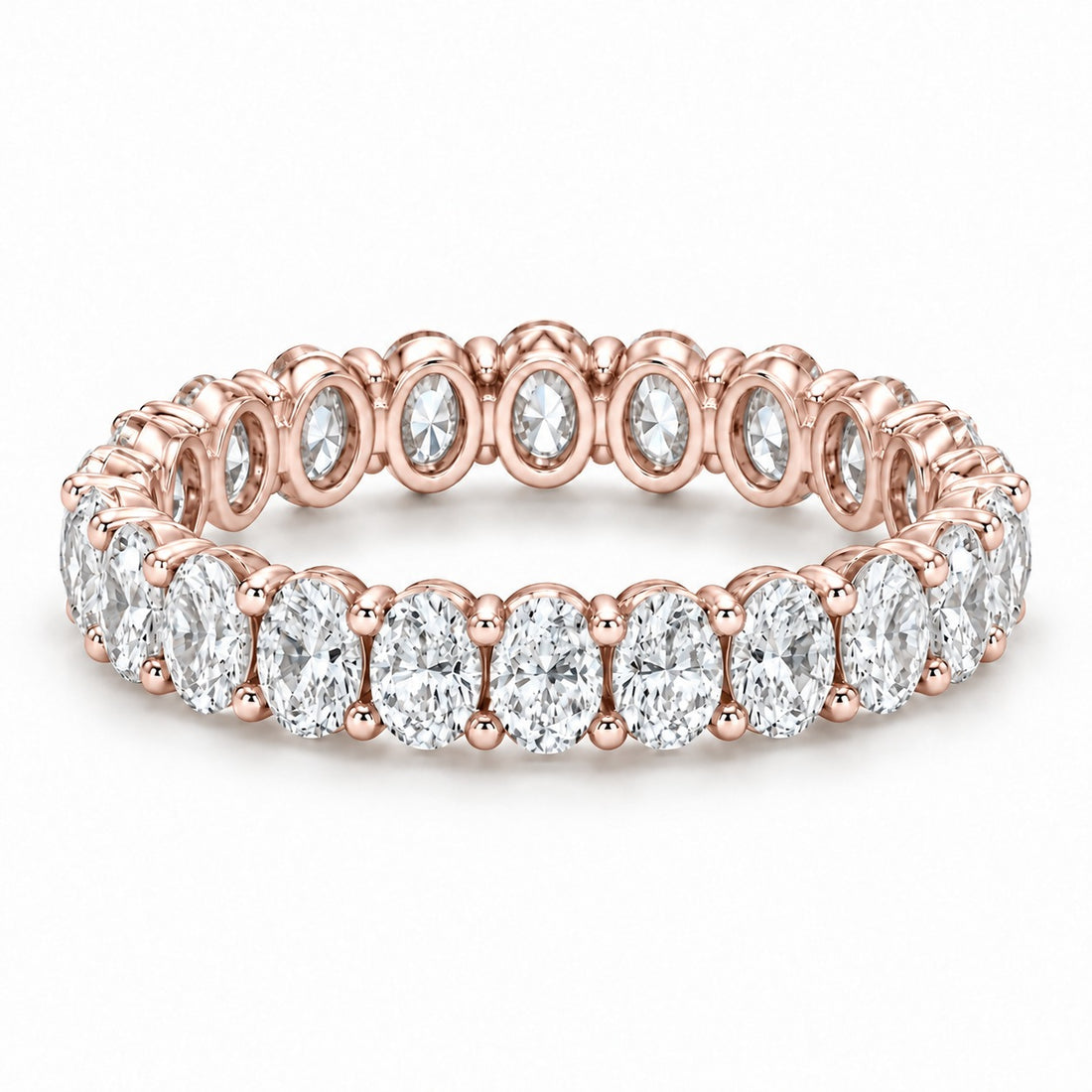 Oval lab-grown diamond eternity band, 4x3mm, 14K rose gold, angled view