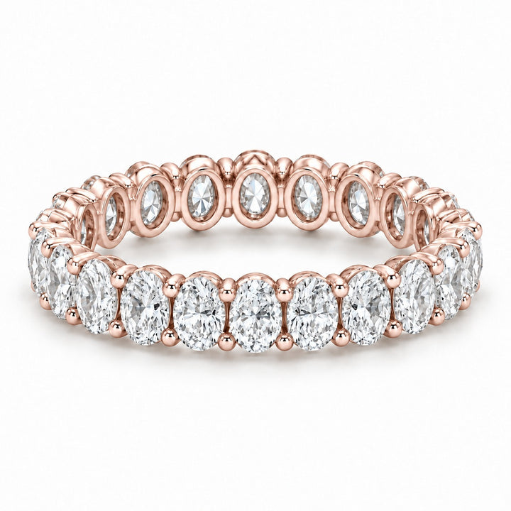 Oval lab-grown diamond eternity band, 4x3mm, 14K rose gold, angled view