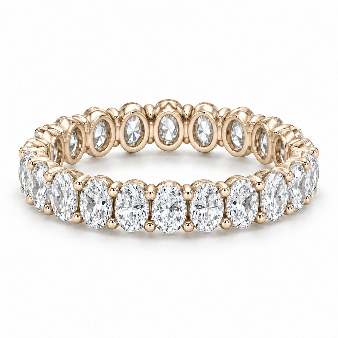 Oval lab-grown diamond eternity band, 4x3mm, 14K yellow gold, angled view