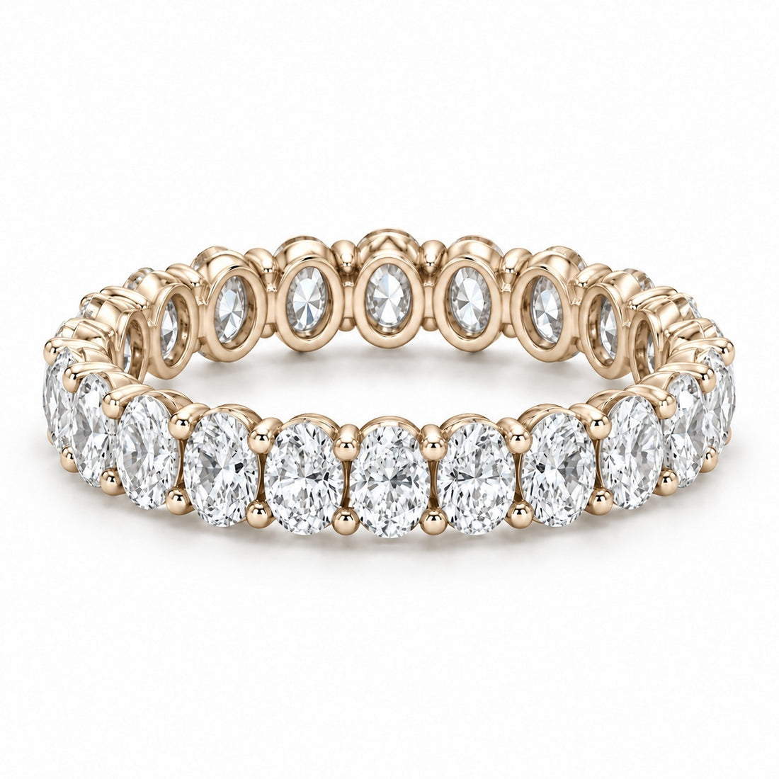 Oval lab-grown diamond eternity band, 4x3mm, 14K yellow gold, angled view