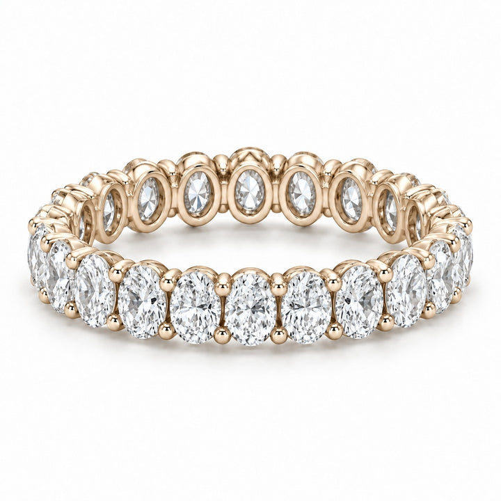 Oval lab-grown diamond eternity band, 4x3mm, 14K yellow gold, angled view