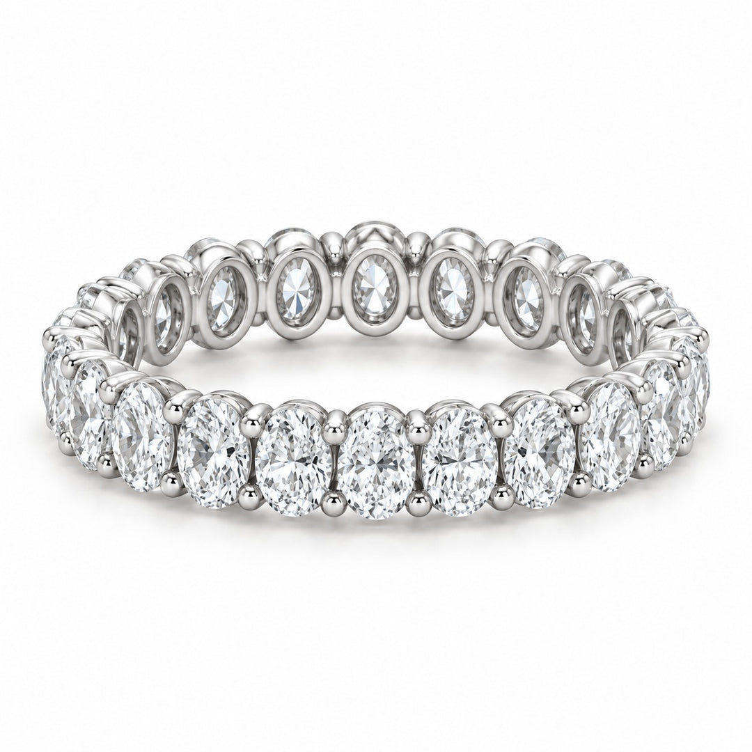 Oval lab-grown diamond eternity band, 4x3mm, 14K white gold, angled view