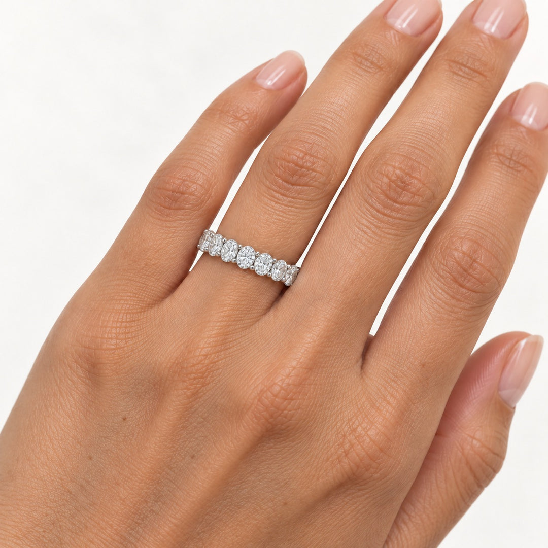 Oval lab-grown diamond eternity band, 4x3mm, 14K white gold, on the hand