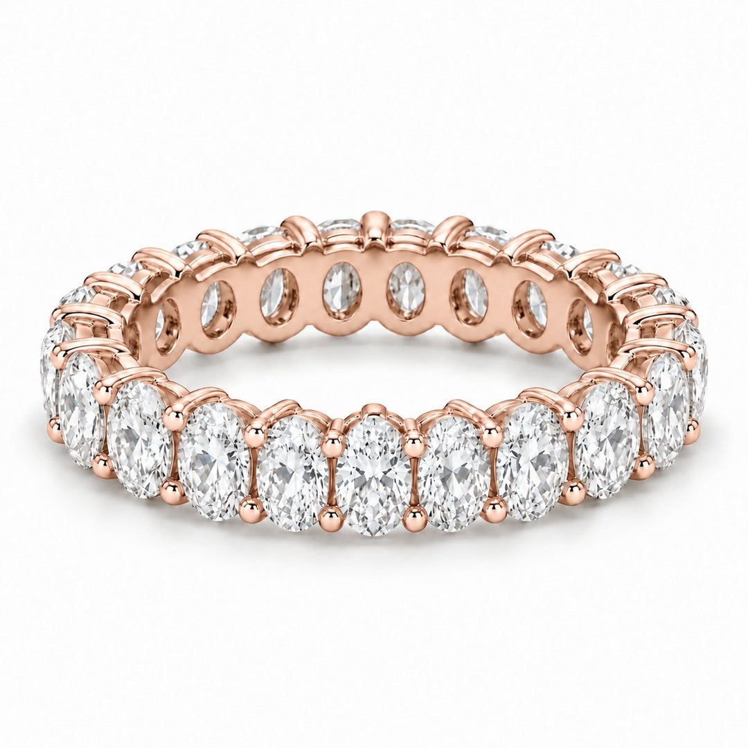 Oval lab-grown diamond eternity band, 5x3.5mm, 14K rose gold, angled view