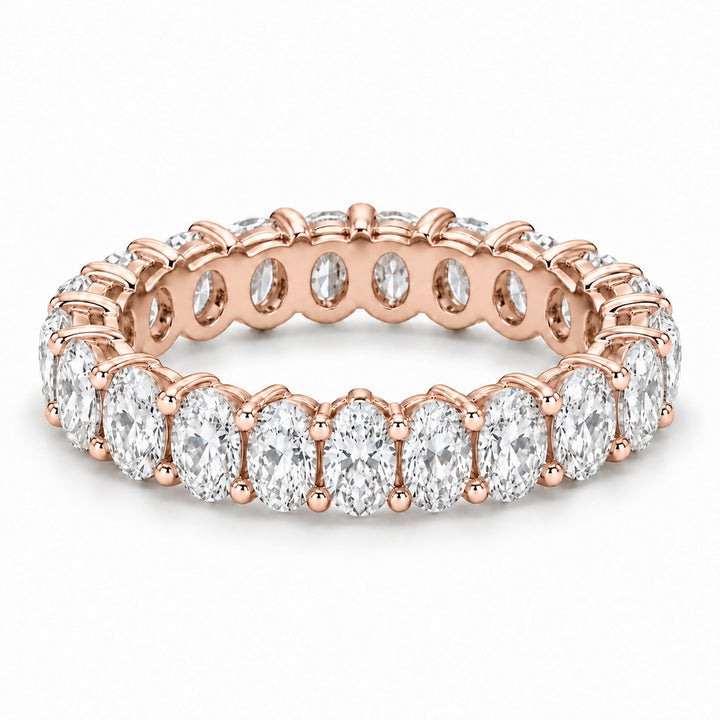 Oval lab-grown diamond eternity band, 5x3.5mm, 14K rose gold, angled view