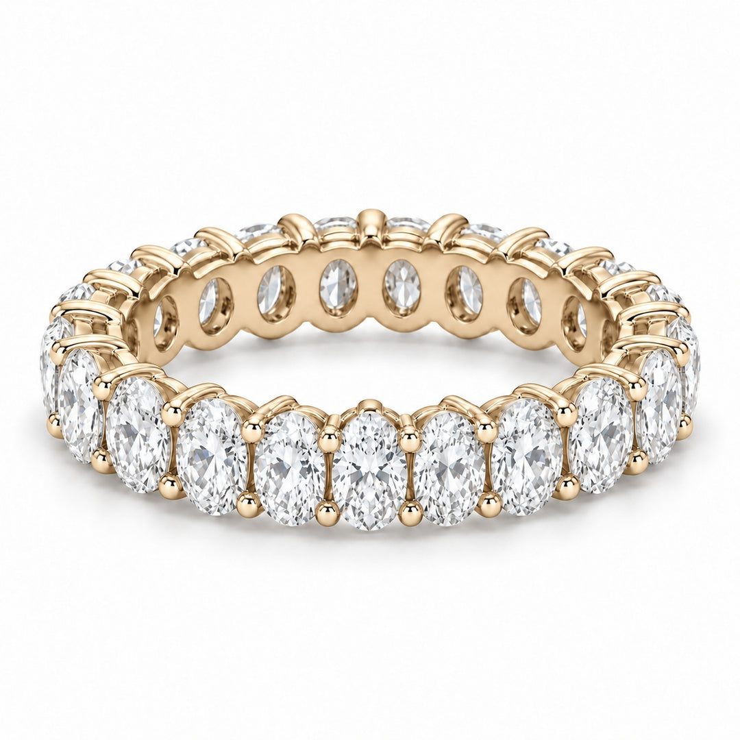 Oval lab-grown diamond eternity band, 5x3.5mm, 14K yellow gold, angled view