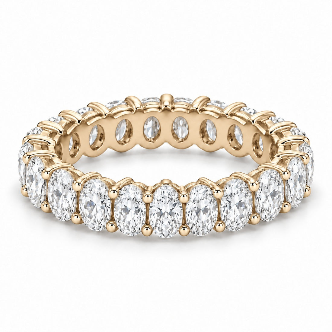 Oval lab-grown diamond eternity band, 5x3.5mm, 14K yellow gold, angled view