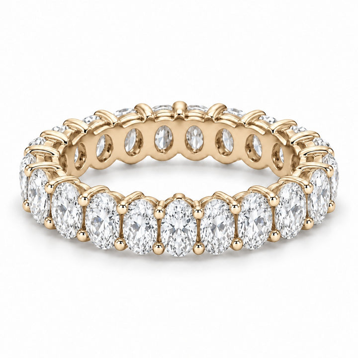 Oval lab-grown diamond eternity band, 5x3.5mm, 14K yellow gold, angled view