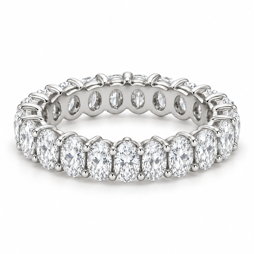 Oval lab-grown diamond eternity band, 5x3.5mm, 14K white gold, angled view