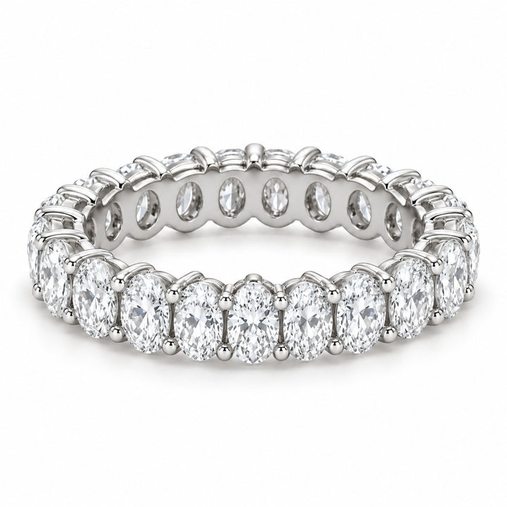 Oval lab-grown diamond eternity band, 5x3.5mm, 14K white gold, angled view