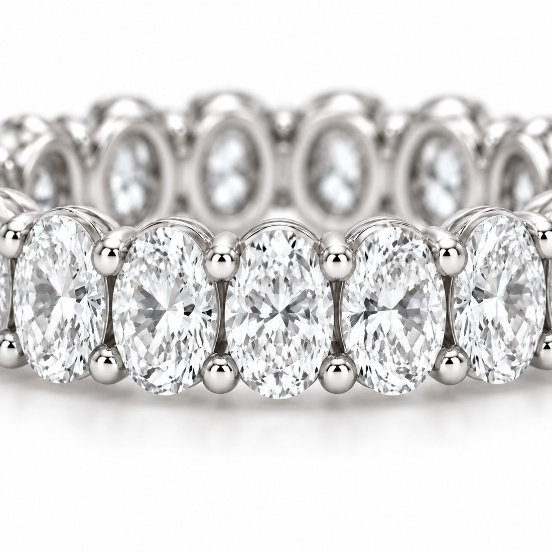 Oval lab-grown diamond eternity band, 5x3.5mm, 14K white gold, macro of the stones
