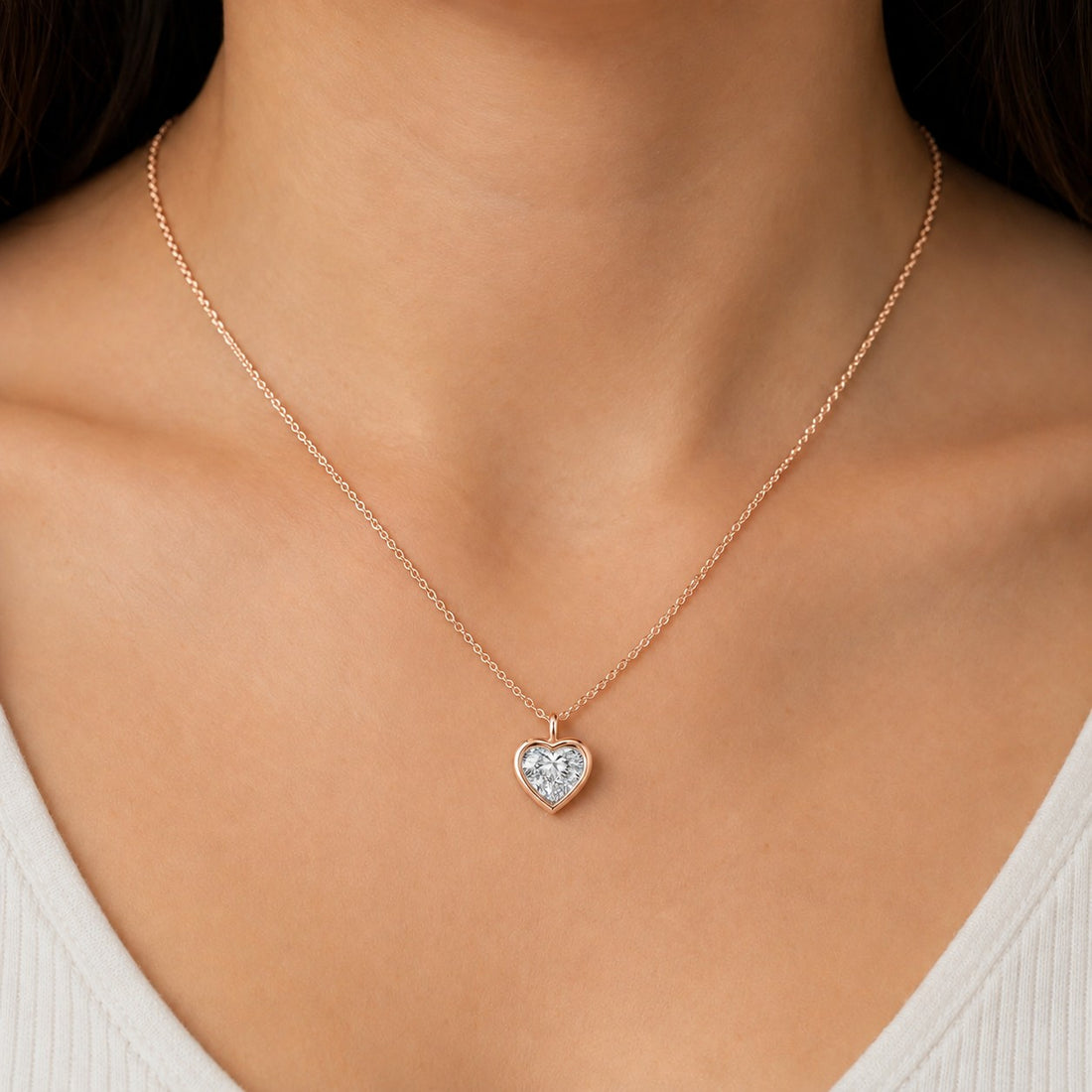 Bezel-Set Heart Lab Diamond Pendant — 1.00ct worn on model in 14K Rose Gold