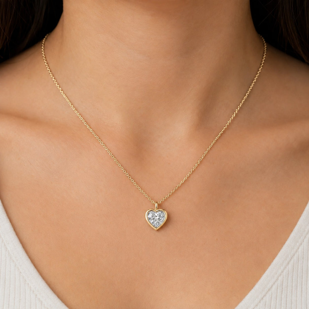 Bezel-Set Heart Lab Diamond Pendant — 1.00ct worn on model in 14K Yellow Gold