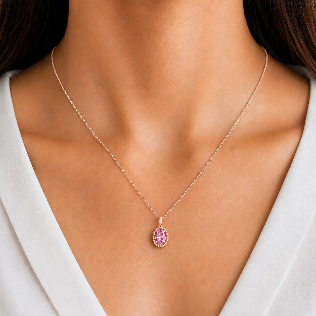Oval Bezel Lab Pink Sapphire Pendant — 1.00ct worn on model in 14K Rose Gold