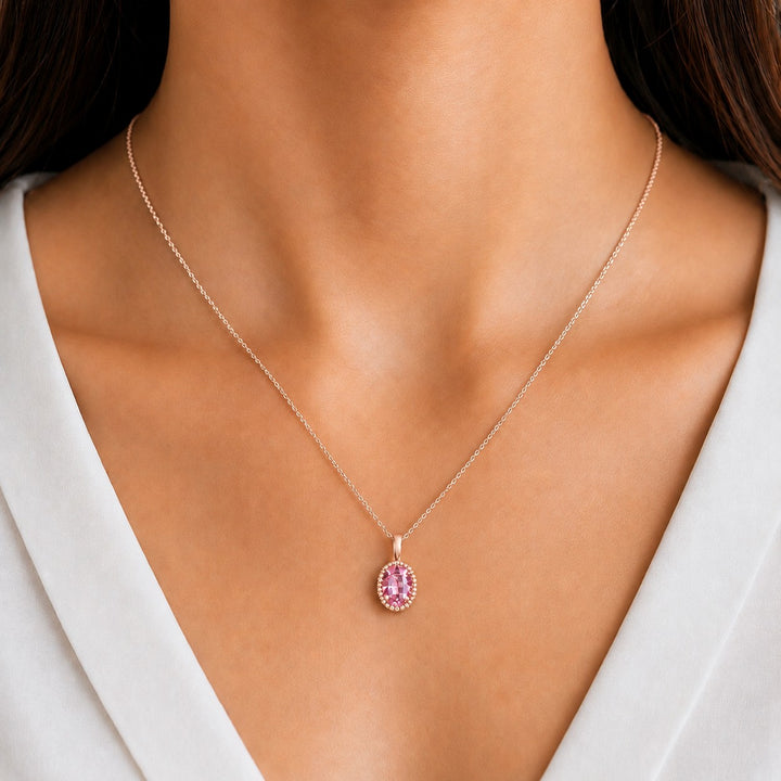 Oval Bezel Lab Pink Sapphire Pendant — 1.00ct worn on model in 14K Rose Gold