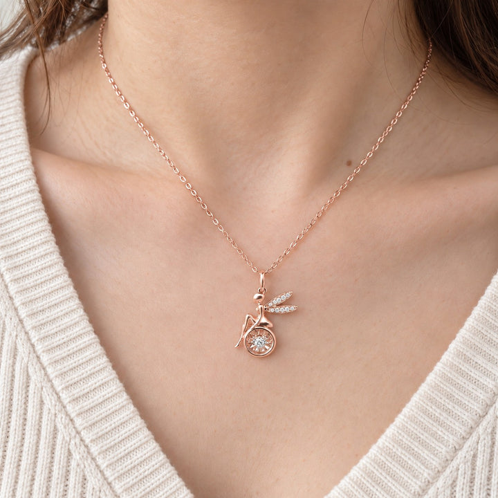 Fairy Pendant with Dancing Lab Diamond worn on model in 14K Rose Gold